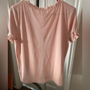 pink button up shirt